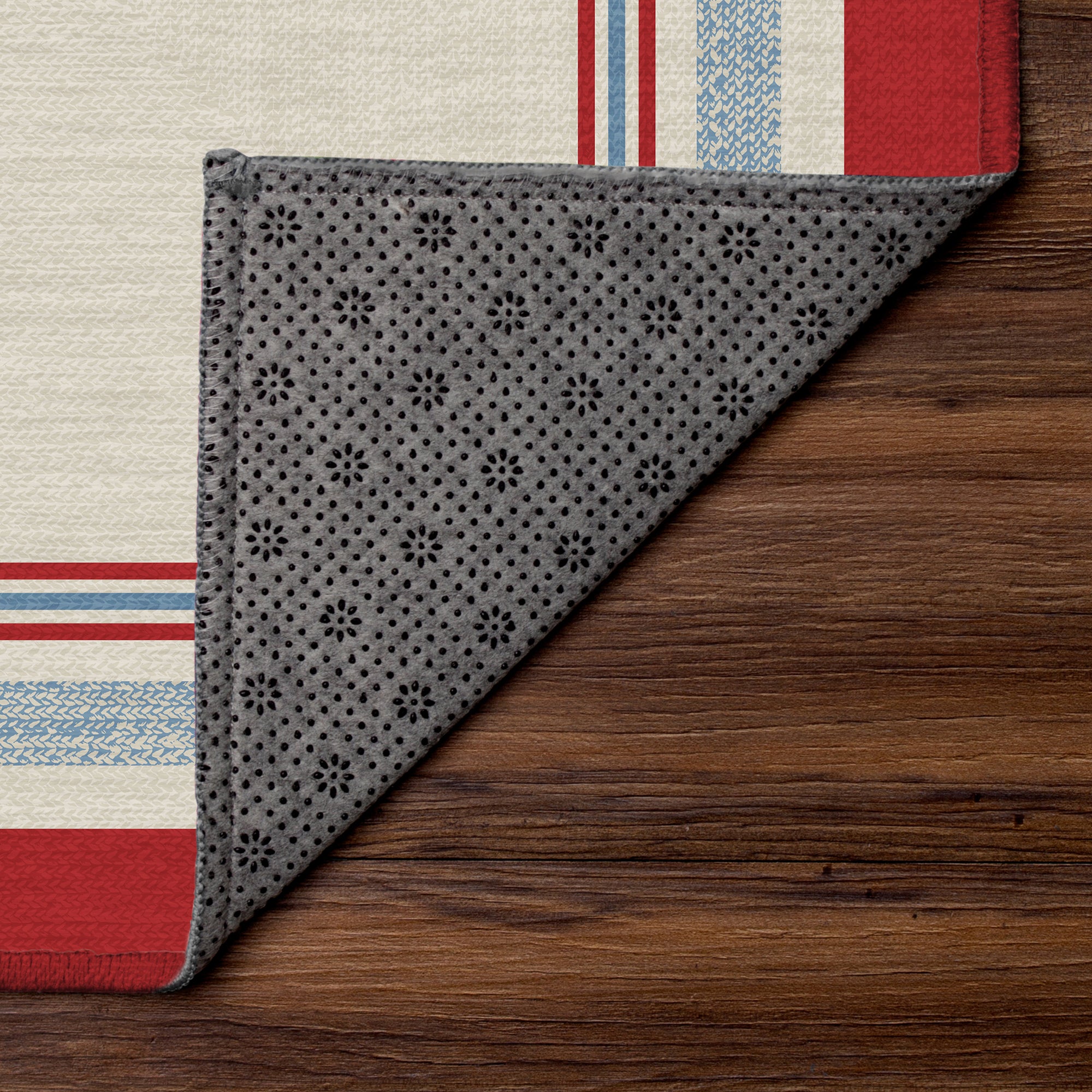 Kennedy bordered washable area rug with red and blue stripe frame on ivory base designed for living rooms, bedrooms, and hallways with non slip backing.