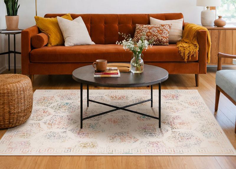 Cozy living room with a brown sofa, coffee table, and decorative elements.